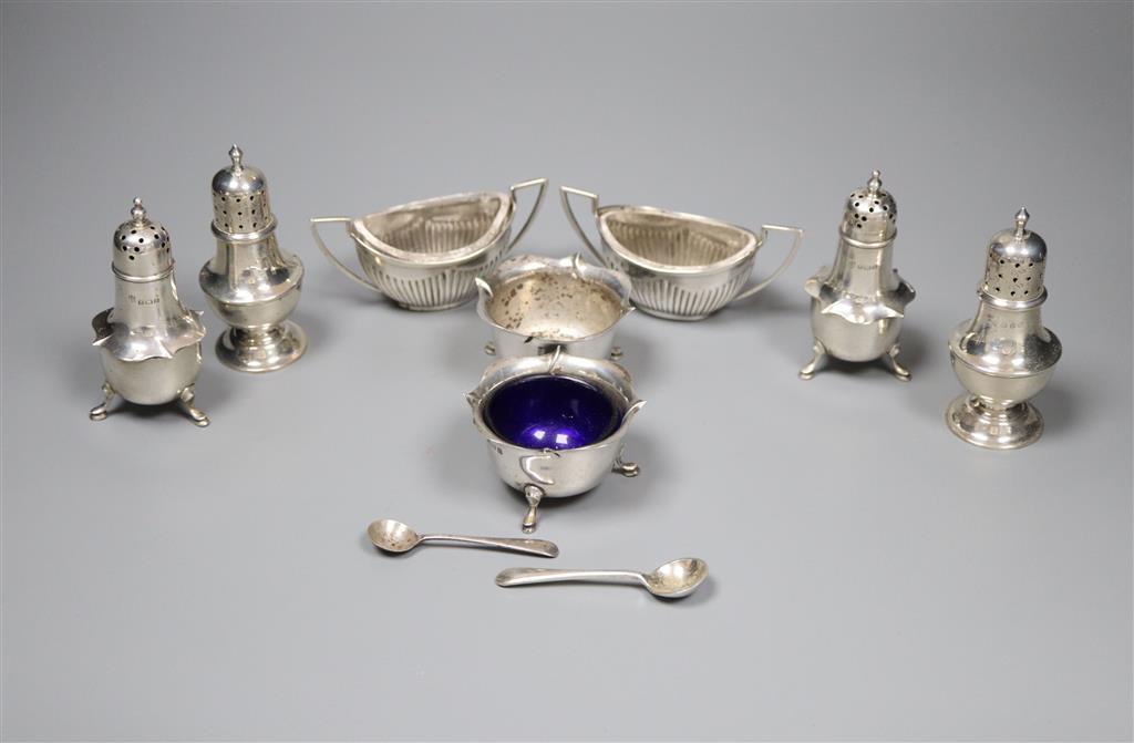 Eight assorted Victorian and later silver condiments.